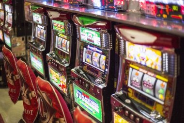 Asia Gaming blackjack dealer positioning cards at live table